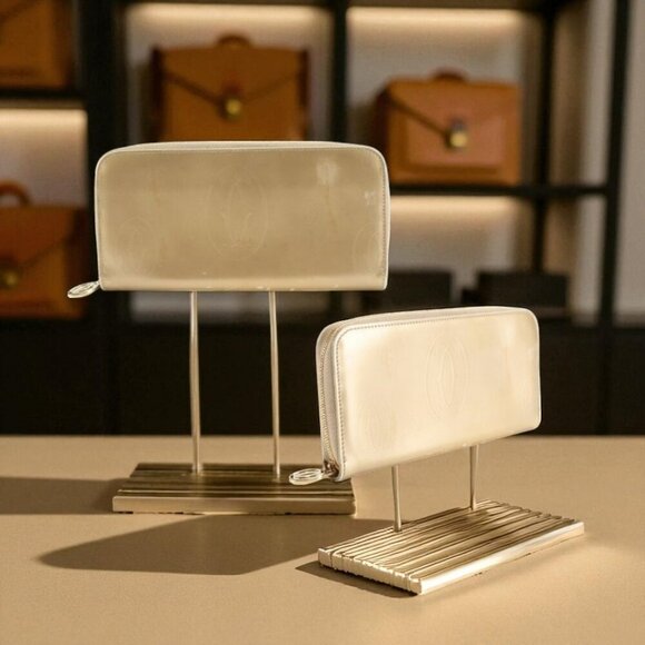 Cartier Handbags - Cartier Happy Birthday Round Zip Long Wallet in gold-colored patent leather